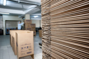 A stack of unassembled cardboard boxes.