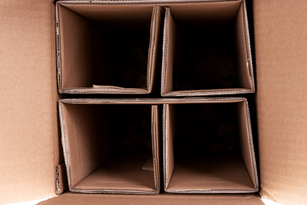 A cardboard boxes with four sections.